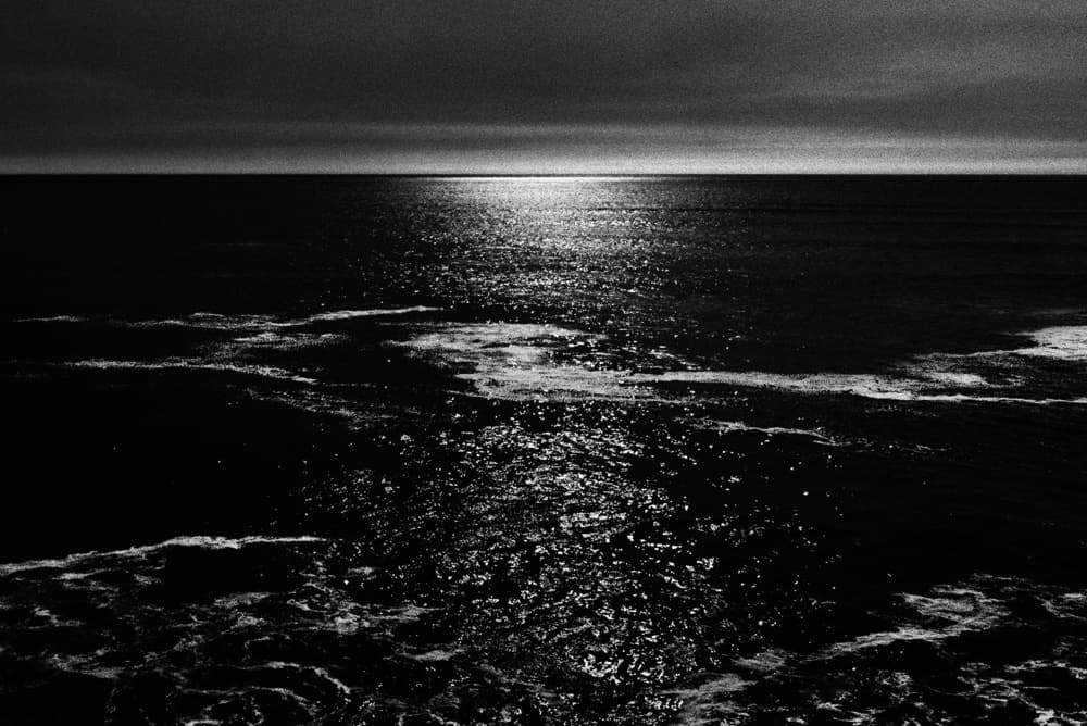 Glimmering Dark Ocean by Paulo Abrantes — canvas wall art