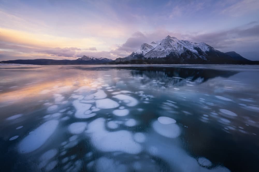Frozen Lake Ice Bubbles by Yongnan Li (李永男) — canvas wall art
