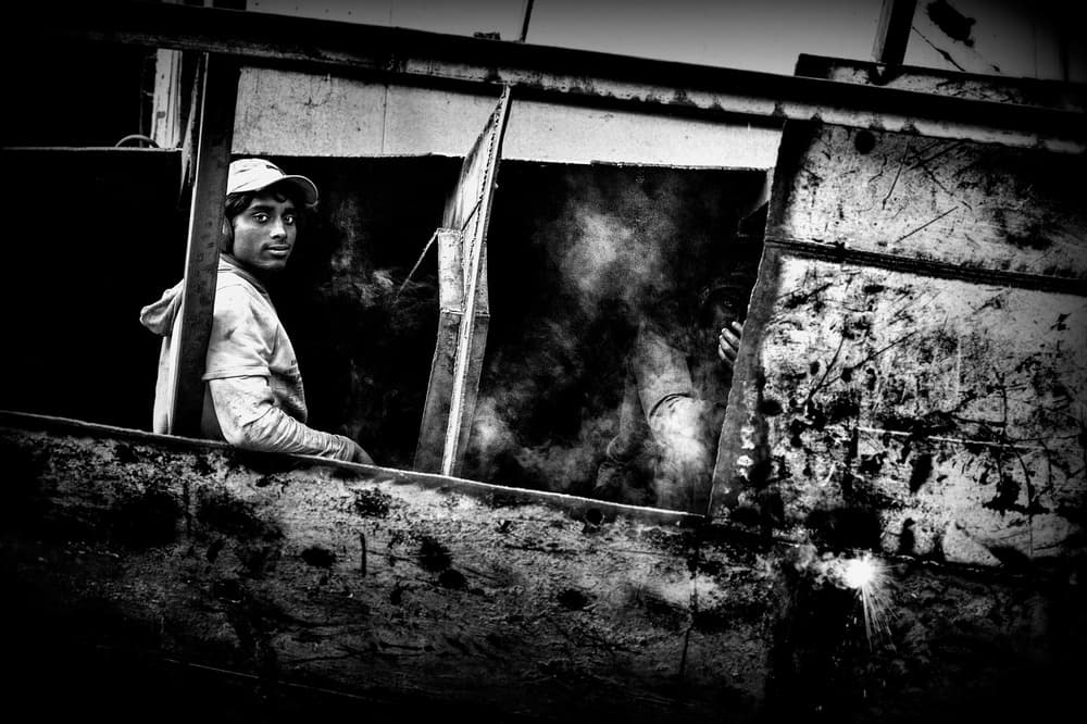 Gritty Industrial Worker by Joxe Inazio Kuesta Garmendia — canvas wall art