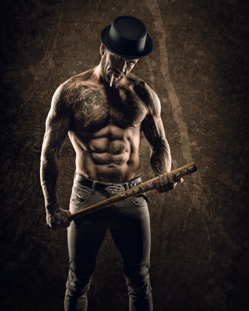 Tattooed Man with Bat by Petri Damstén — canvas wall art