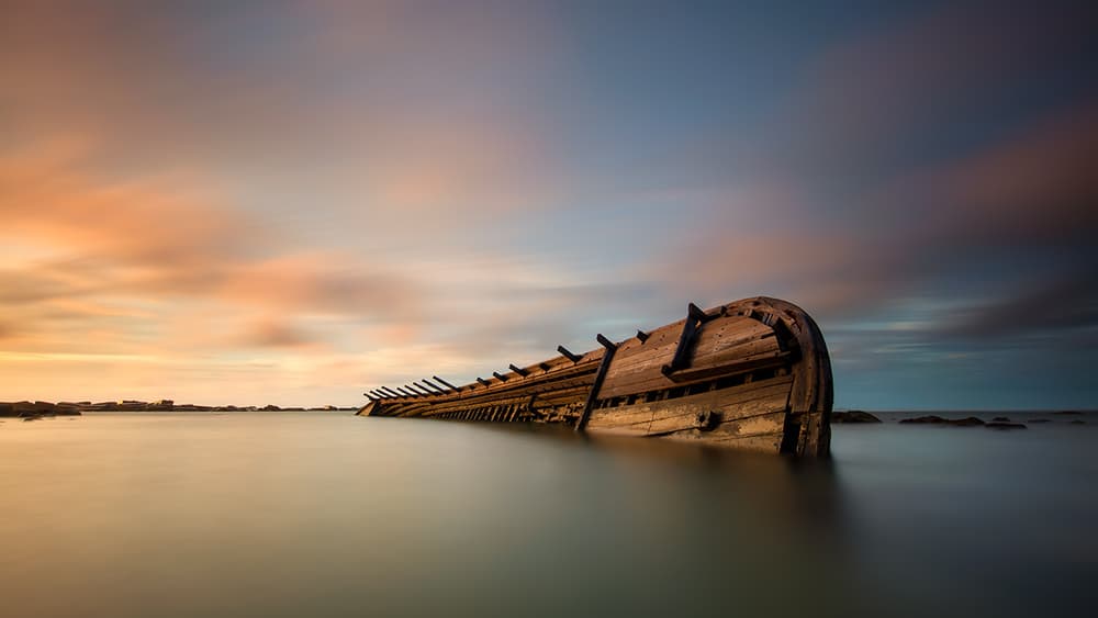 Serene Shipwreck Sunset by Gunarto Song — canvas wall art