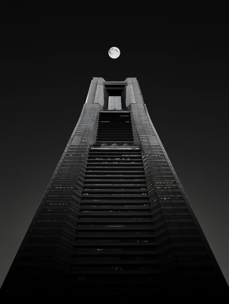 Towering Moonlit Skyscraper by Adachi Lintaman — canvas wall art