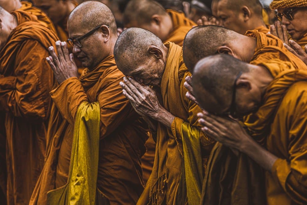 Praying Buddhist Monks by Marco Tagliarino — canvas wall art