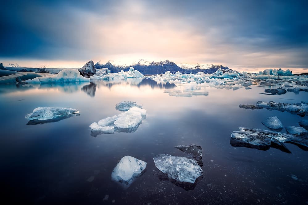 Glacial Lagoon Reflections by David Martin Castan — canvas wall art