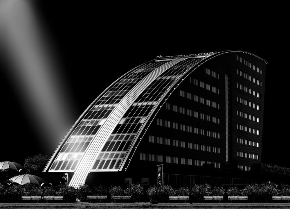 Dramatic Curved Building by Greetje van Son — canvas wall art