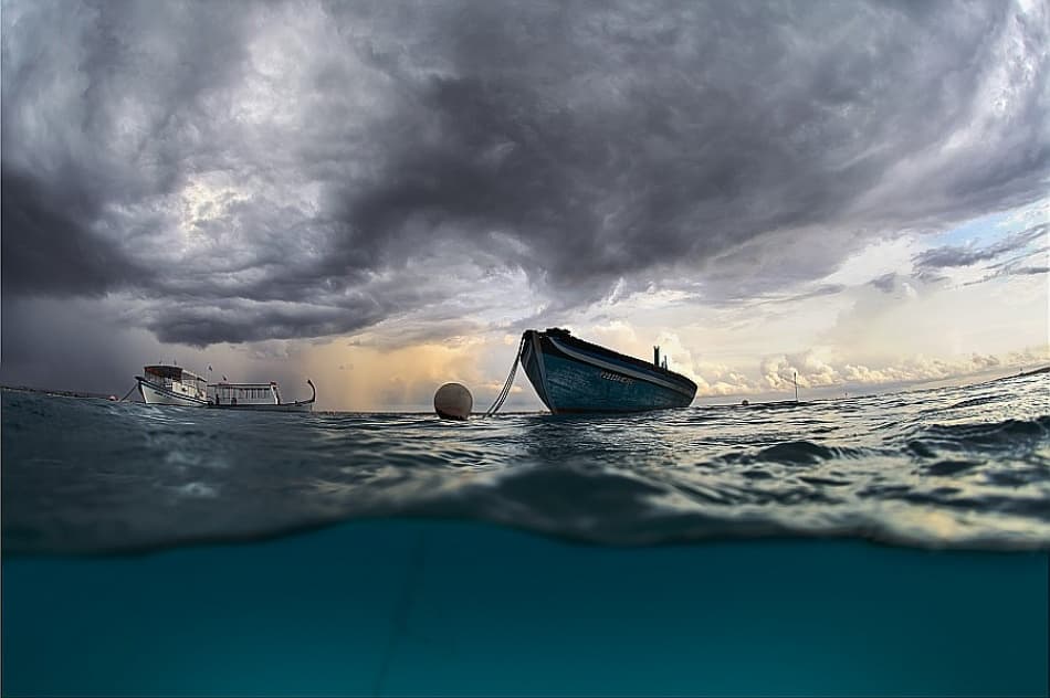 Calm Boat Under Storm by Andrey Narchuk — canvas wall art