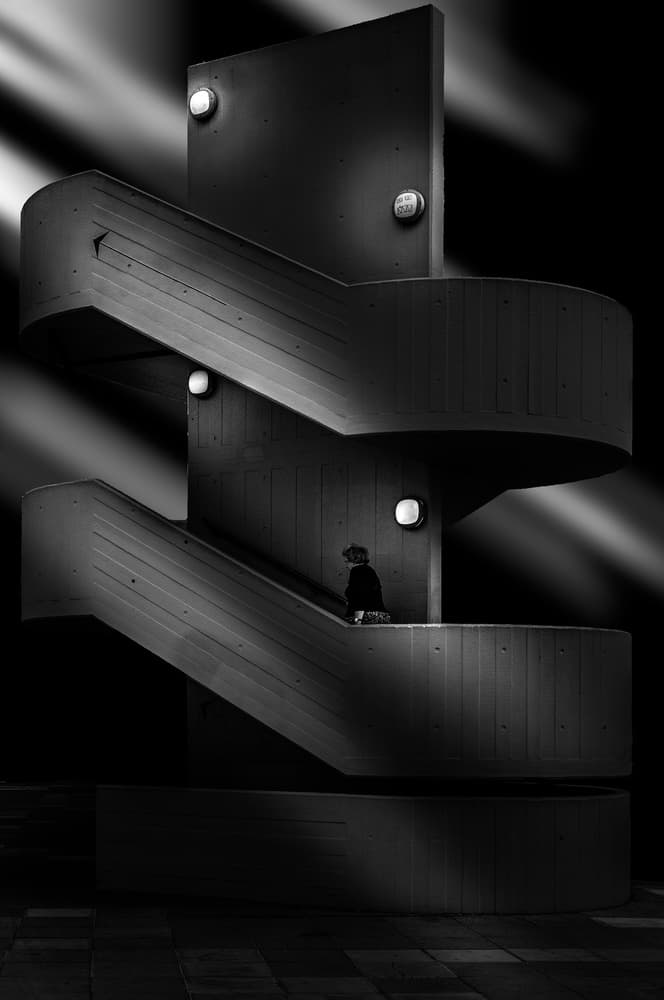 Figure on Brutalist Stairs by Luigi Greco — canvas wall art