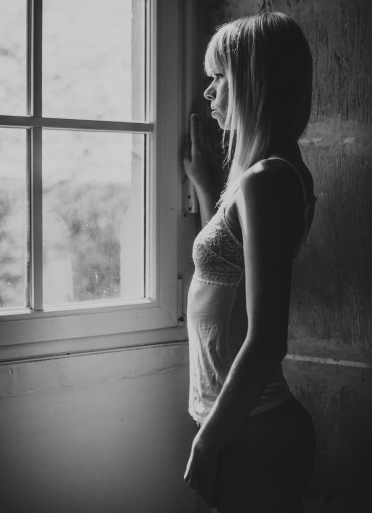 Pensive Woman By Window by Georgios Bero — canvas wall art