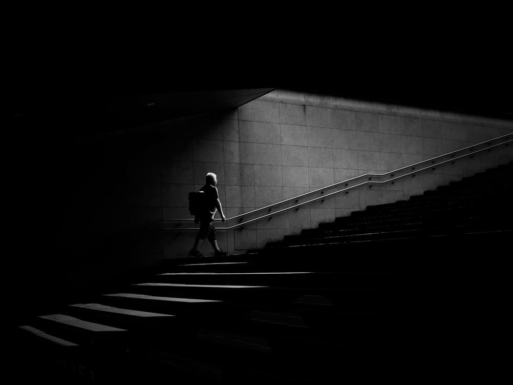 Lone Figure Ascending Stairs by Yasuhiro Takachi — canvas wall art