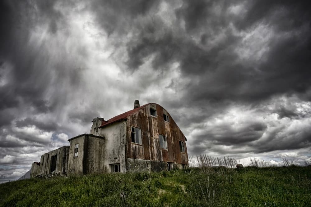 Weathered House Stormy Sky by Þorsteinn H. Ingibergsson — canvas wall art