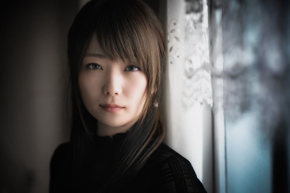 Thoughtful Gaze by Window by Nobu Ishijima — canvas wall art