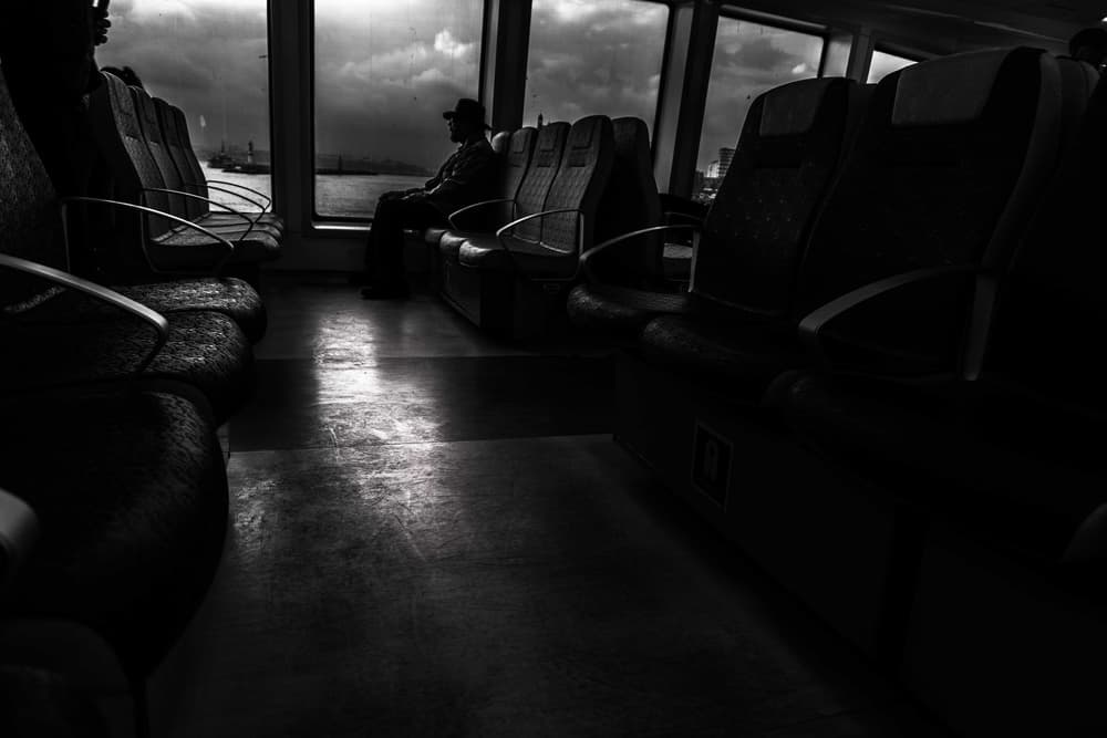 Solitary Man Window View by Ramiz Sahin — canvas wall art
