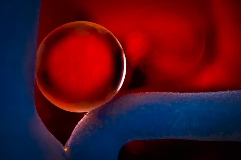 Vibrant Red Blue Orb by Hilde Ghesquiere — canvas wall art