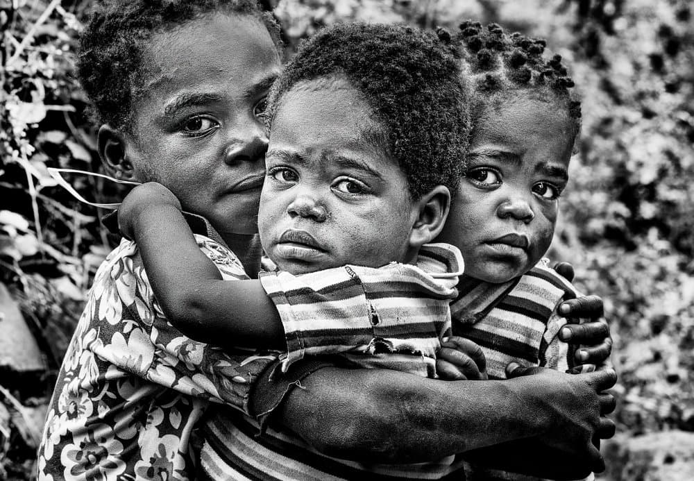 Young Children's Embrace by Joxe Inazio Kuesta Garmendia — canvas wall art