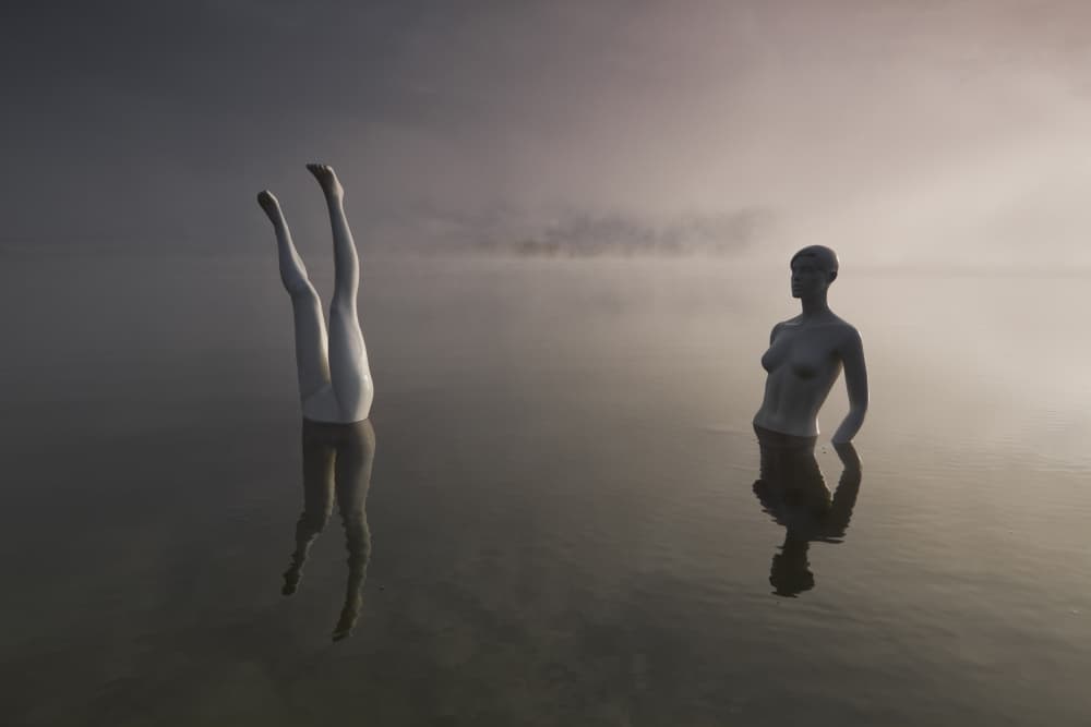 Mannequins in Misty Water by Leszek Paradowski — canvas wall art