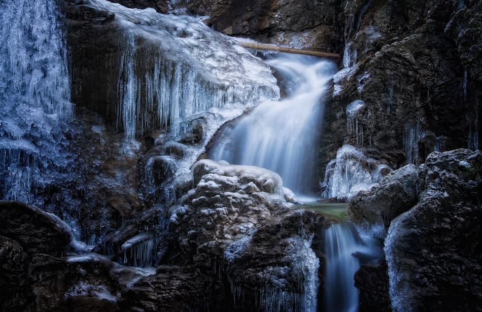 Frozen Blue Waterfall by Norbert Maier — canvas wall art