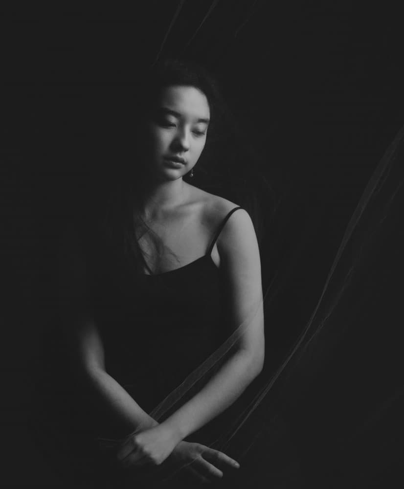 Thoughtful Woman Portrait by Ruiqing P. — canvas wall art