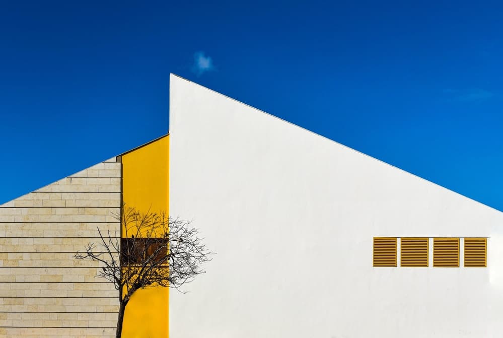 Geometric Building Blue Sky by Arnon Orbach — canvas wall art