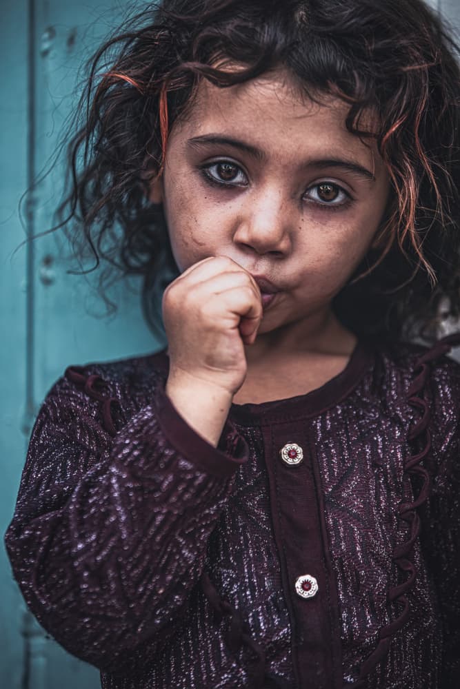 Solemn Child Portrait by Marco Tagliarino — canvas wall art