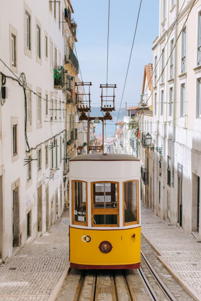 Iconic Lisbon Street Tram by Claudia Casal — canvas wall art