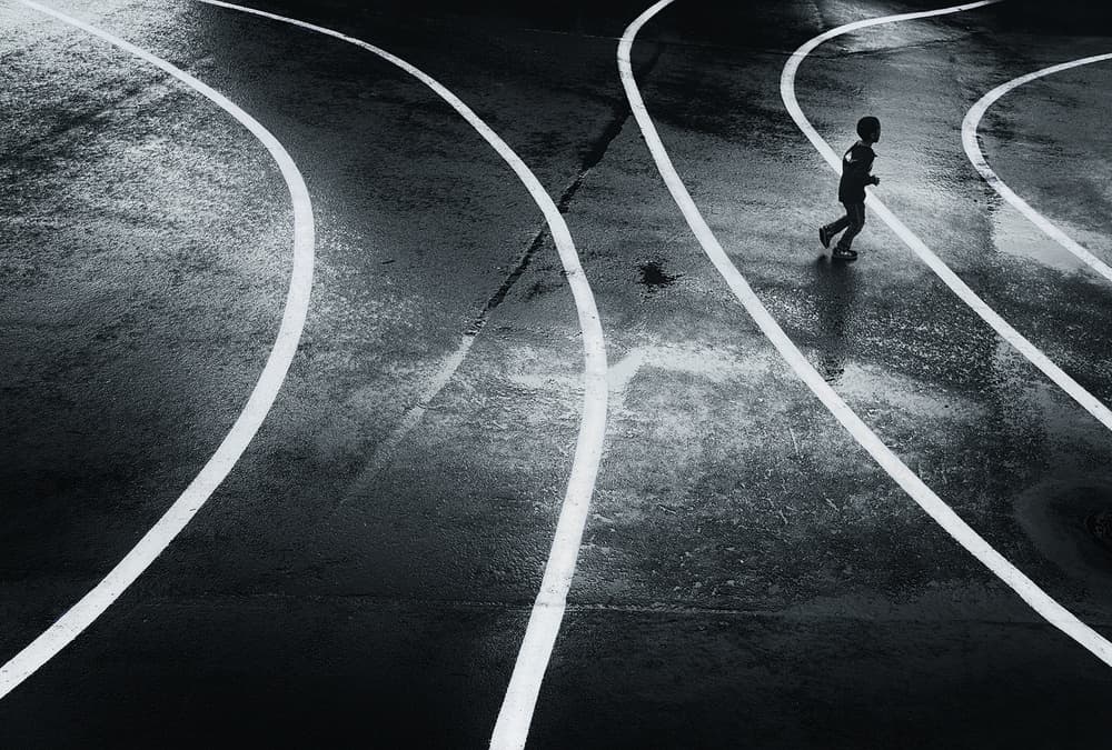 Boy on Wet Track by Dani BS. — canvas wall art