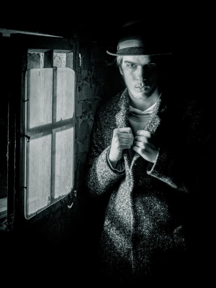 Noir Man By Window by Luc Stalmans — canvas wall art