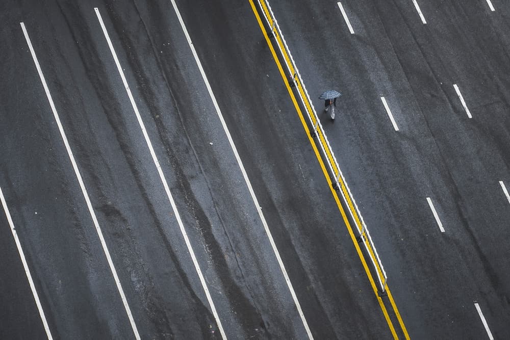 Solitary Walk Wet Road by TIANQI — canvas wall art