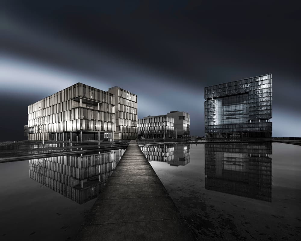 Sleek Urban Reflections by Roland M Schwerdtfeger — canvas wall art
