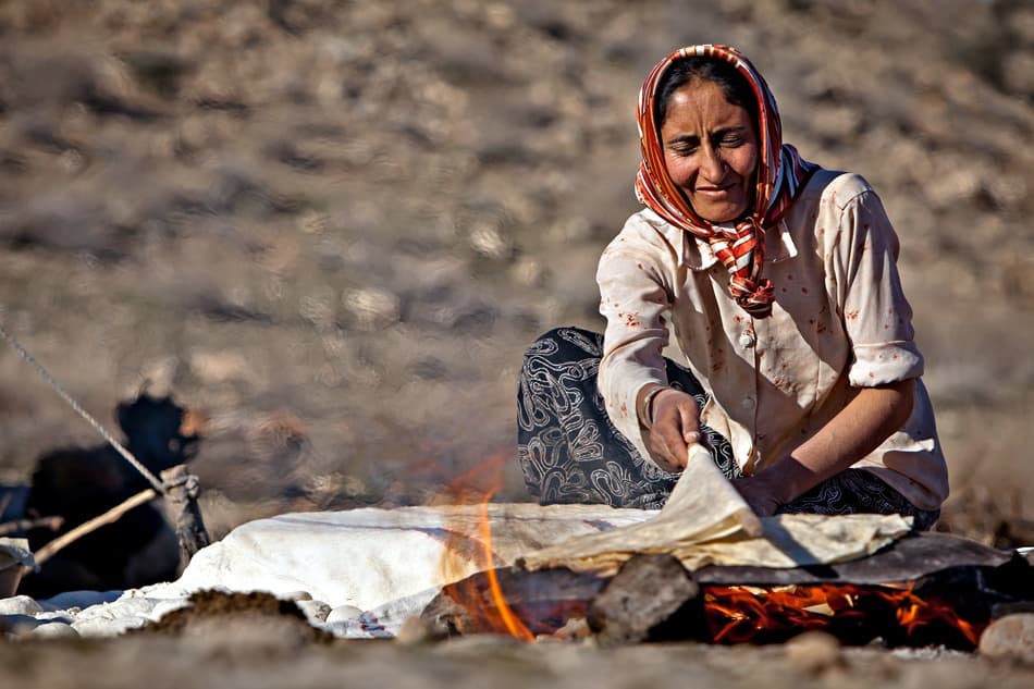 Fireside Flatbread Baking by Mohammadreza Momeni — canvas wall art