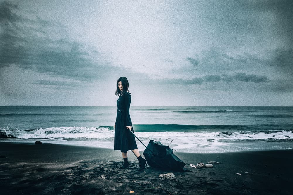 Woman on Stormy Shore by Daisuke Kiyota — canvas wall art