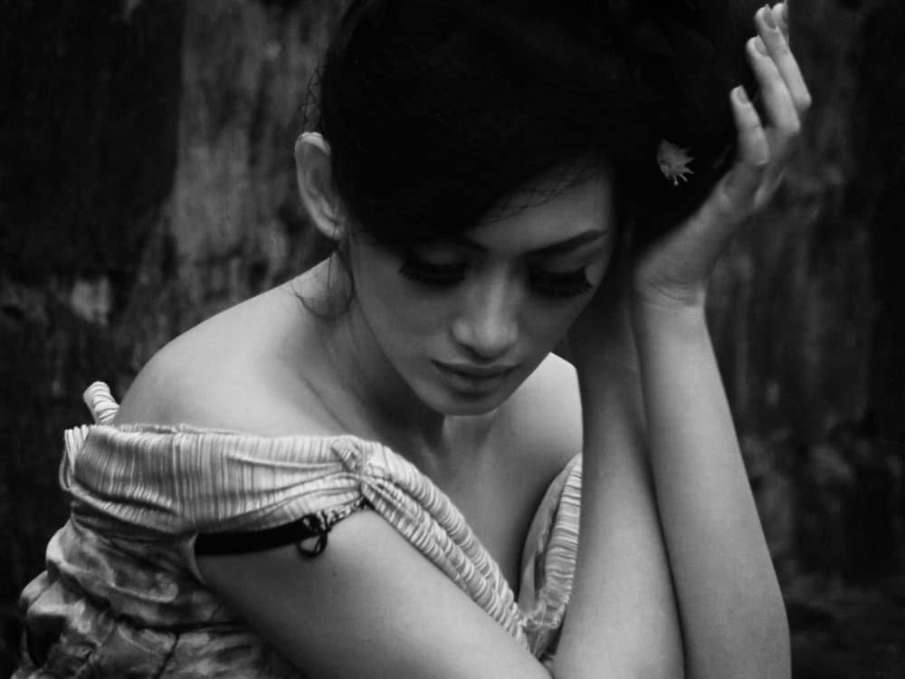 Elegant Pensive Woman by Kahar Lagaa — canvas wall art