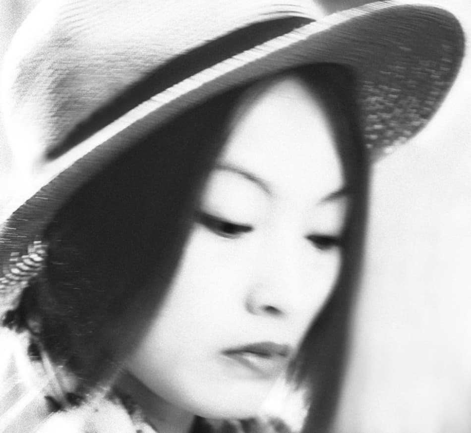 Dreamy Woman in Hat by Adrian Popan — canvas wall art