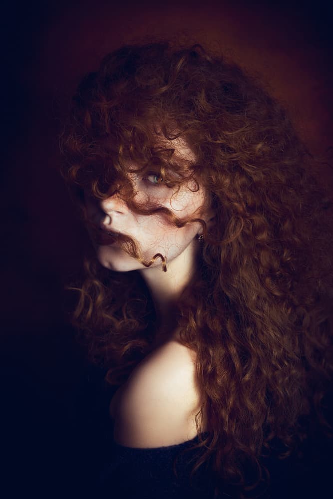 Mysterious Red Curls by Ruslan Bolgov — canvas wall art