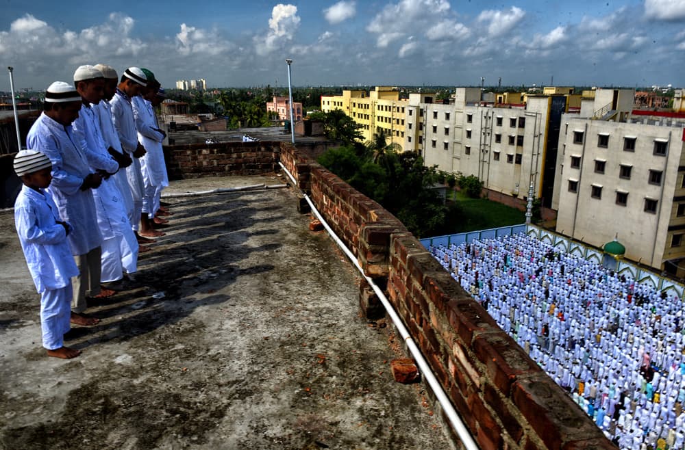 Communal Rooftop Prayer by Avishek Das — canvas wall art