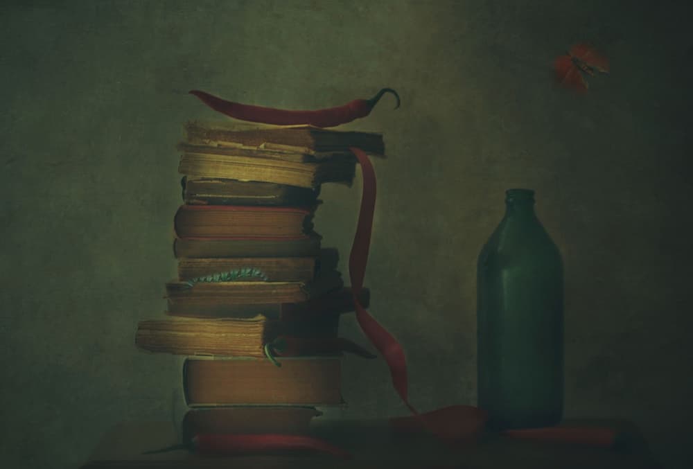 Chilies and Old Books by Delphine Devos — canvas wall art