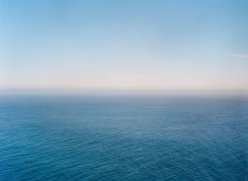 Calm Blue Ocean Horizon by Bethany Young — canvas wall art