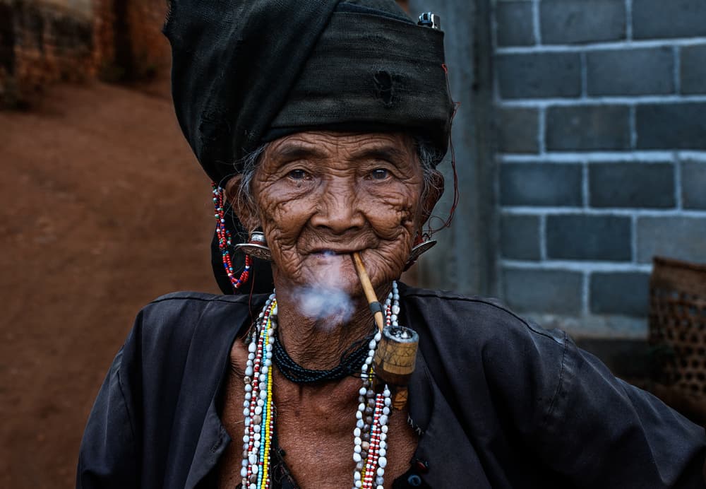 Wise Woman Smoking Pipe by Joxe Inazio Kuesta Garmendia — canvas wall art