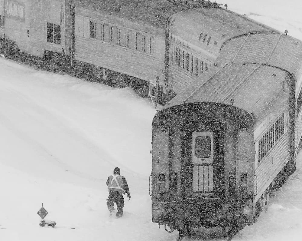 Winter Train in Heavy Snow by Jian Wang — canvas wall art