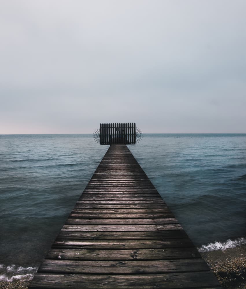 Ocean Pier Barrier by Enrico Sottocorna — canvas wall art