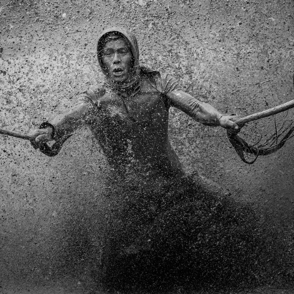 Determined Fisherwoman Splash by Gunarto Song — canvas wall art