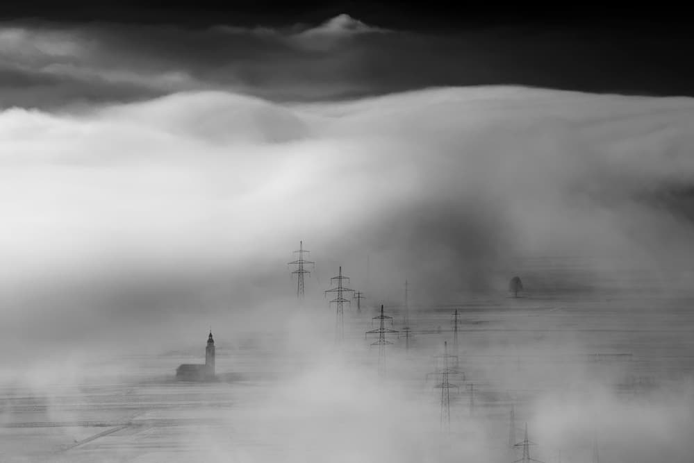 Church and Pylons in Fog by Jure Kravanja — canvas wall art