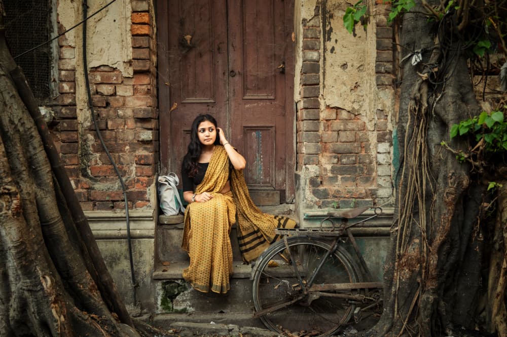 Indian Woman Doorway by Kuntal Biswas — canvas wall art