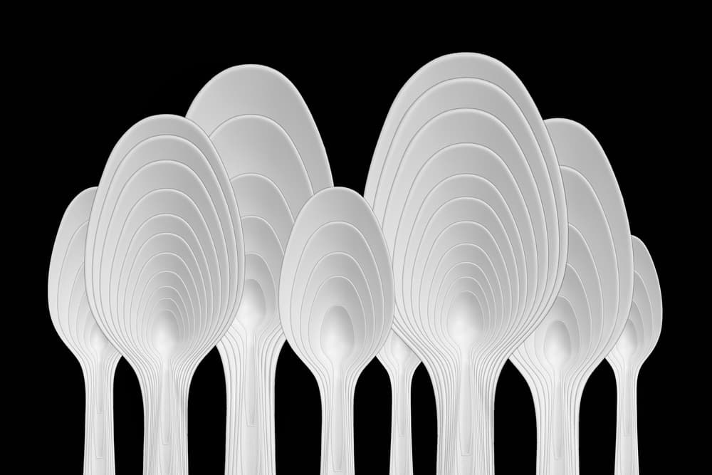 Layered White Spoons by Jacqueline Hammer — canvas wall art
