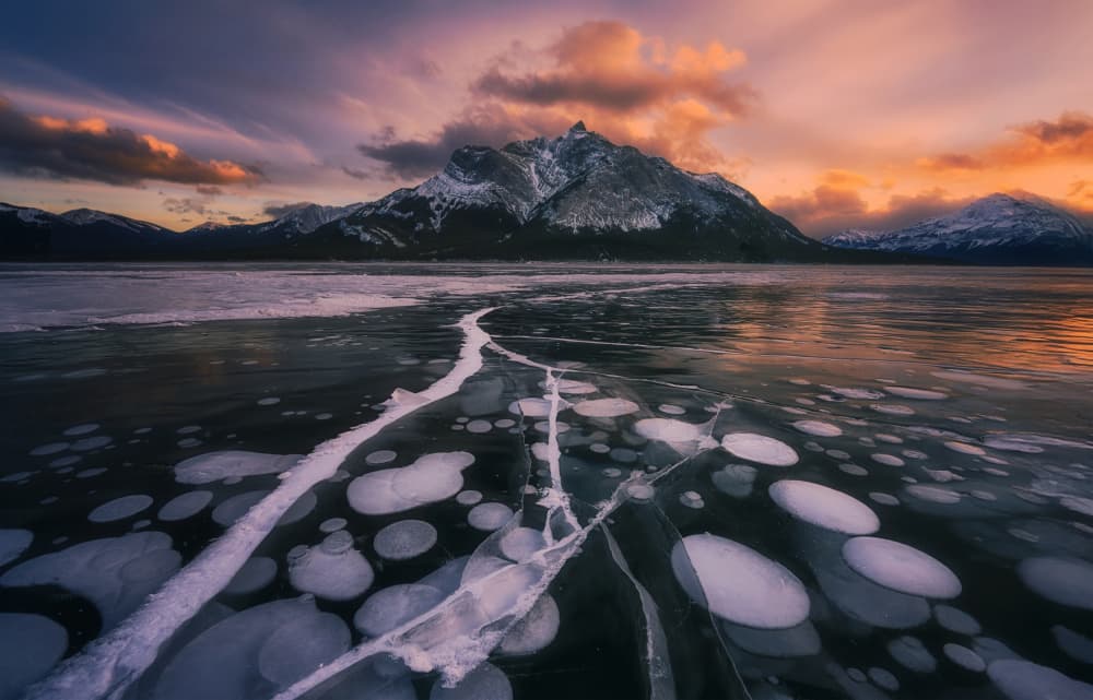 Frozen Lake Sunset by Lydia Jacobs — canvas wall art