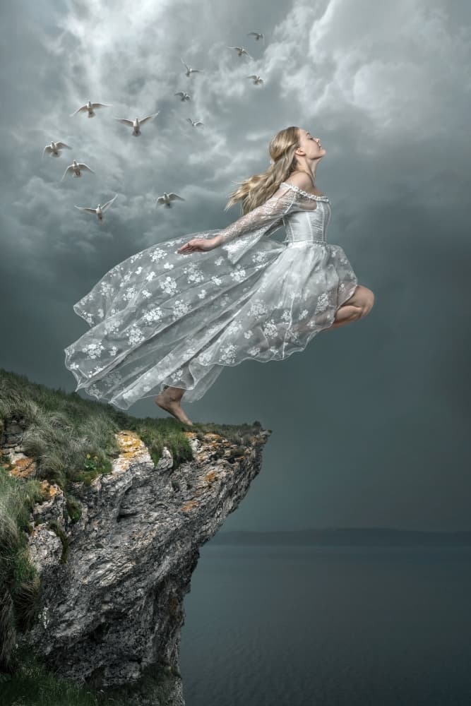 Woman Flying Cliff Edge by Marcel Egger — canvas wall art
