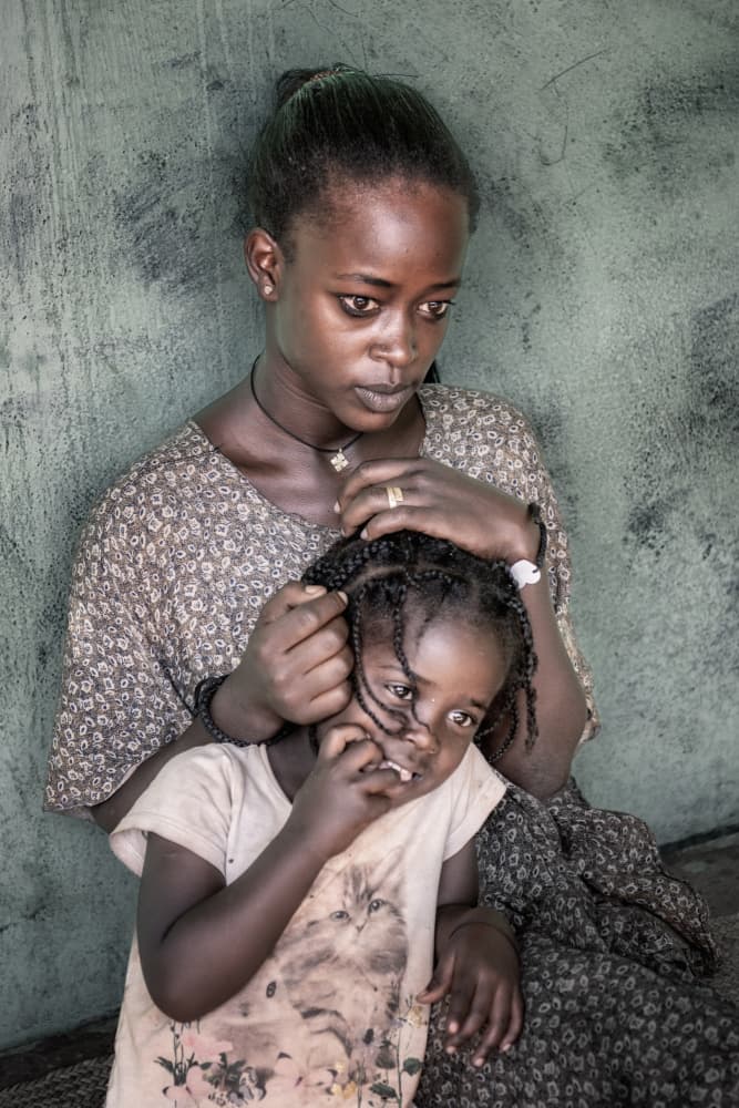 Mother Daughter Braids by Trevor Cole — canvas wall art