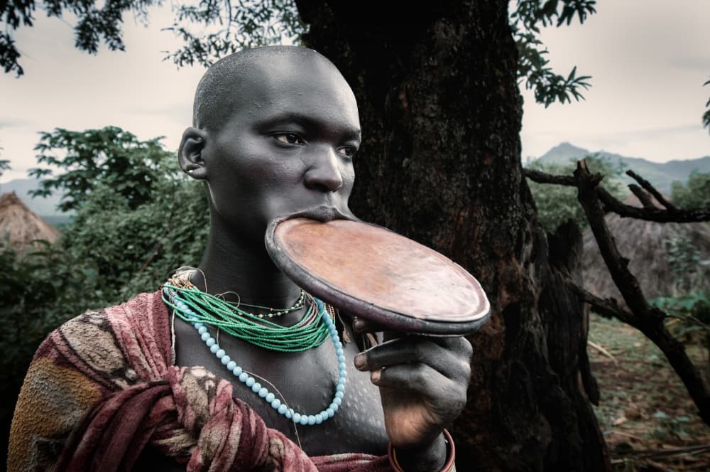African Lip Plate Gaze by Trevor Cole — canvas wall art