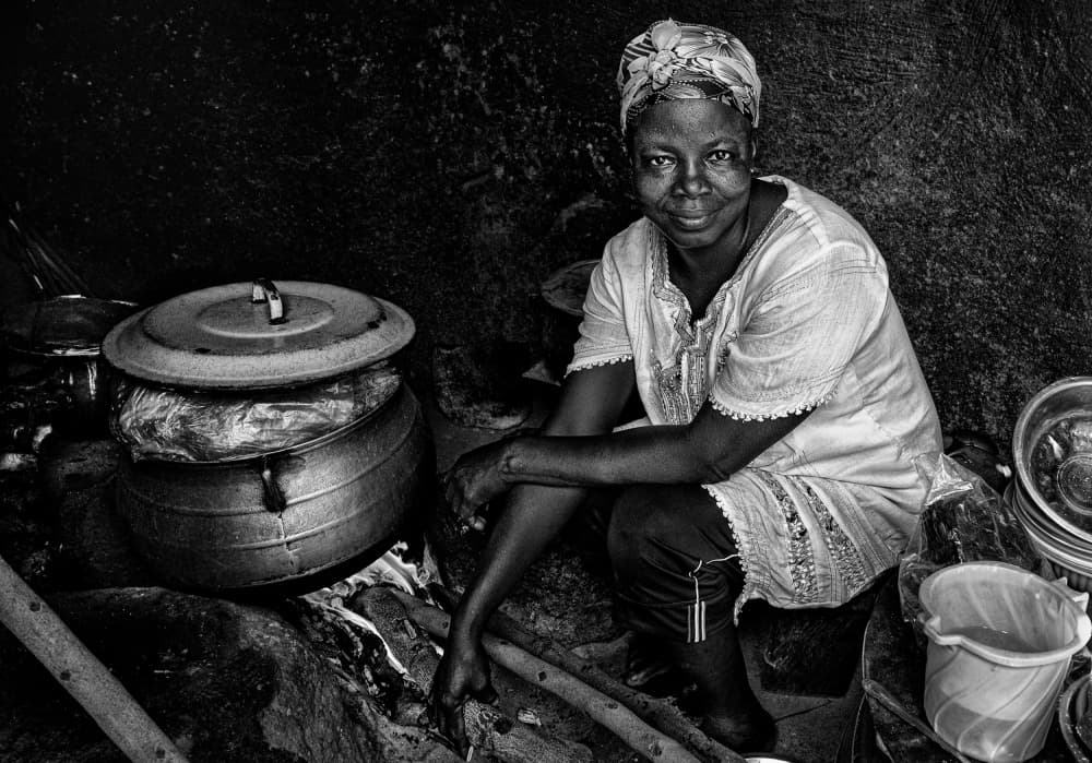 Smiling African Woman by Joxe Inazio Kuesta Garmendia — canvas wall art