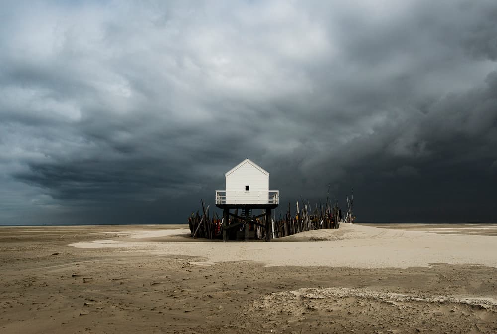 Stilt House Storm Sky by Gerard Jonkman — canvas wall art