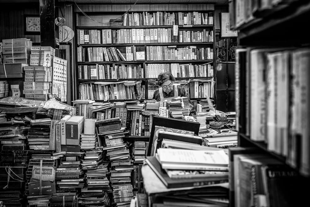 Vintage Bookstore Life by Marco Tagliarino — canvas wall art